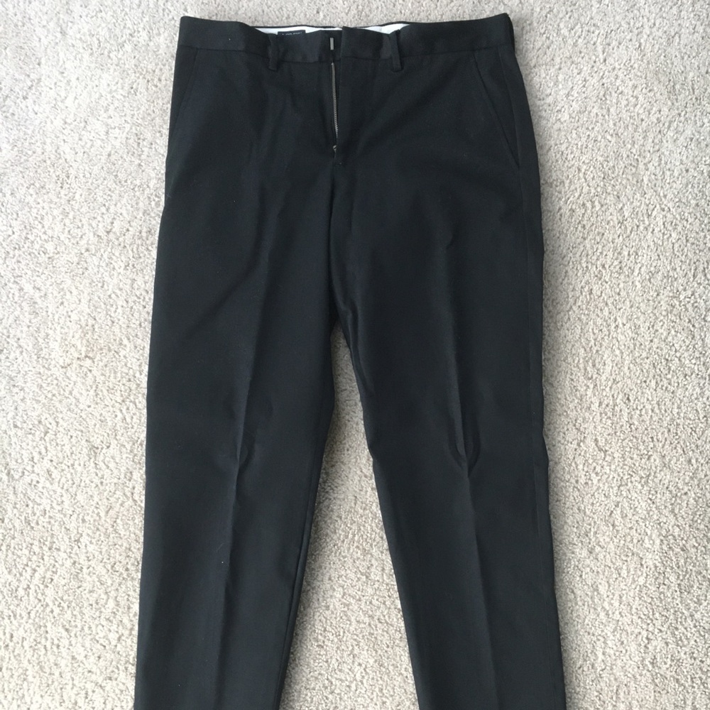 Men’s black slacks
